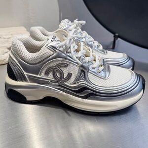 CHANEL Women's Sneakers in White and Silver